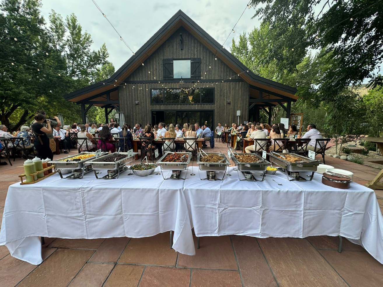 McDevitt Taco Supply catering buffet spread at an outdoor event venue